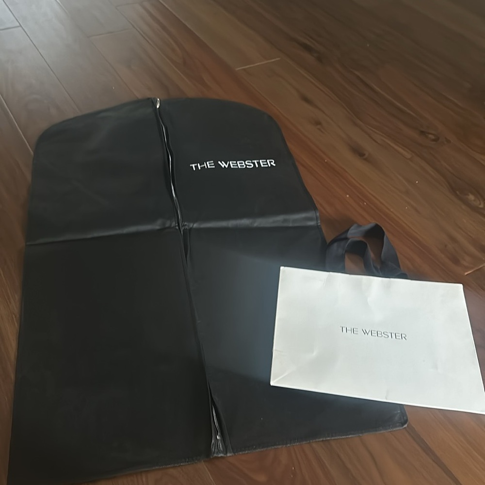 The Webster clothes cover and two paper bags.